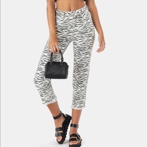 Adika zebra print jeans! Have a straight leg high waisted fit!